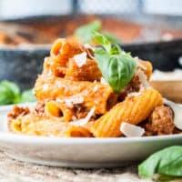 Close up view of Italian sausage pasta on a plate.