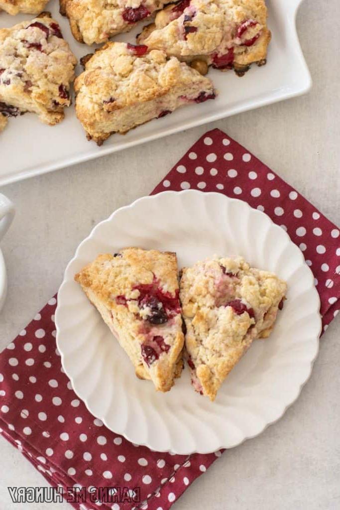 overhead shot of white chocolate cranberry scones on plate